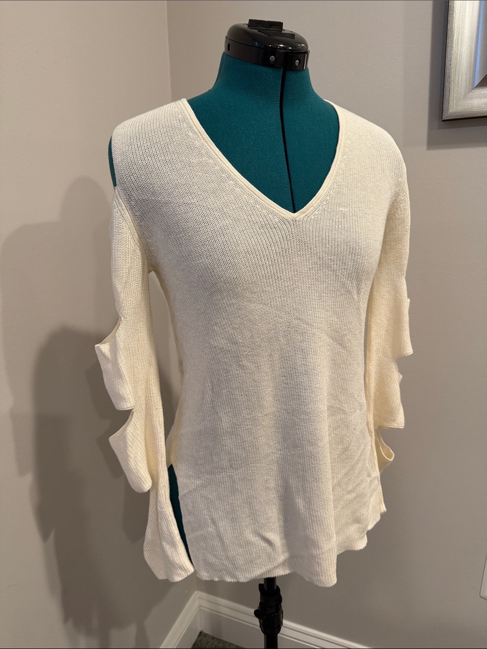 1. State Cream V-Neck Sweater with Ruffle Cutout Sleeves
